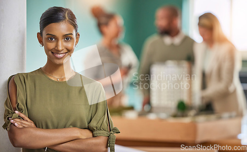 Image of Woman, portrait smile and leadership with arms crossed for meeting, teamwork or collaboration at office. Happy businesswoman, leader or coach smiling in management for team planning at workplace