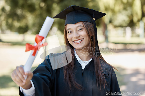 Image of University, graduation and portrait of girl with diploma on campus smile for success, award and achievement. Education, college and happy female graduate with certificate, degree and academy scroll