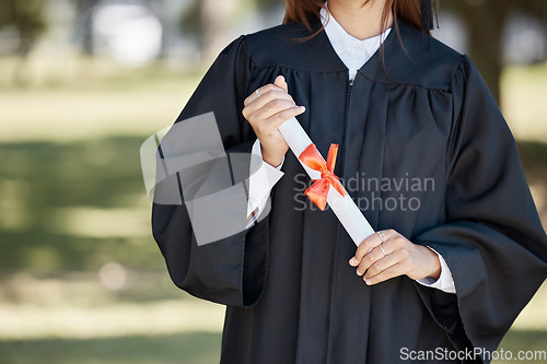 Image of Graduation, education and hands of woman with diploma for ceremony, award and achievement on campus. University success, college and graduate student holding certificate, degree and academy scroll