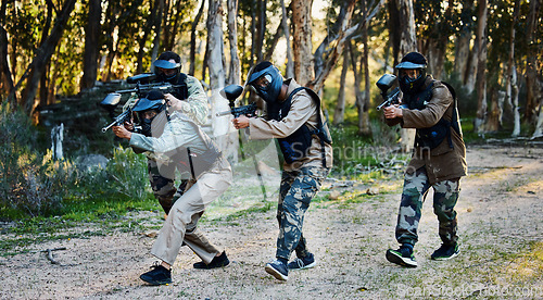 Image of Army, military and people with guns for paintball, shooting game and training in nature. Fitness, teamwork and group of friends playing sporty games, running for battle and target game in a forest