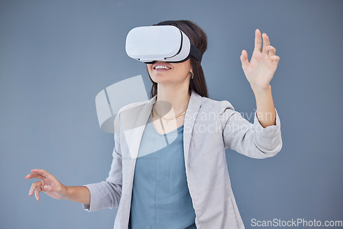 Image of Vr, virtual reality and business woman in studio exploring metaverse with digital technology. 3d, ai and happy female employee with futuristic headset for gaming, web browsing or fantasy simulation.