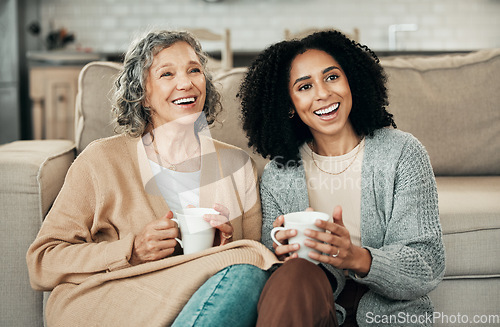 Image of Love, mother and adult daughter on floor, coffee and quality time in living room, happiness and relax. Family, female child or mama with tea, smile or loving together in lounge, rest and conversation