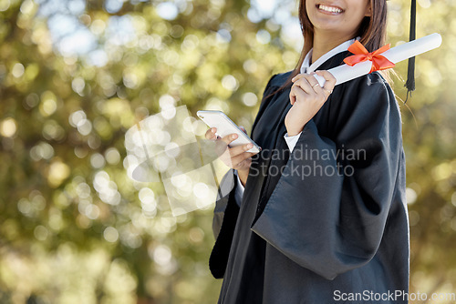 Image of Graduation, university diploma and girl with phone on campus smile for success, award and achievement. Education, college and happy graduate student with certificate, degree and texting on smartphone