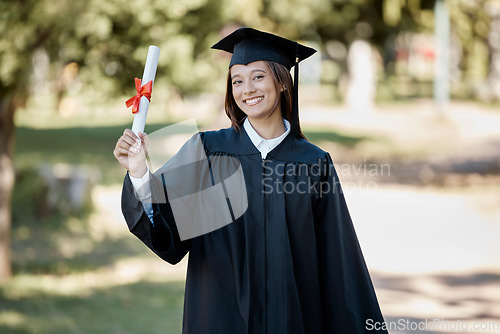 Image of University certificate, graduation and girl with smile on campus for success, award and achievement. Education, college academy and happy portrait of graduate student with diploma, degree and scroll