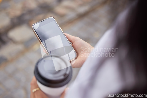 Image of Phone, coffee and screen with a woman in the city browsing social media or typing a text message from above. Contact, texting and 5g mobile technology with a female person outside in an urban town