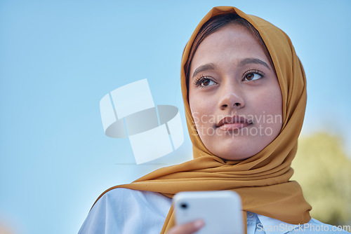 Image of Muslim, young woman in hijab and outdoor with phone, travel with social media and face with peace and calm. Islamic fashion, youth and gen z with thinking, smartphone and female in Dubai with mockup