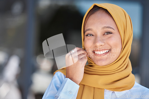 Image of Travel, smile and portrait of Muslim woman in city for happy, relax and natural in Dubai. Islamic, positive and confident with face of girl wearing hijab in urban town with mockup and happiness