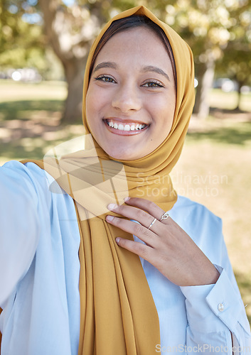 Image of Muslim, young woman and selfie with hijab outdoor, happy influencer with travel blog, freedom in nature and vacation. Islamic fashion, gen z youth and female smile in picture in Dubai with memory