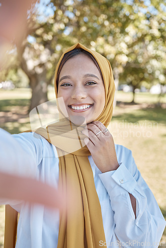 Image of Muslim, woman in park with hijab and selfie, freedom and travel, nature with peace and calm outdoor. Islamic fashion, youth and gen z with adventure, lifestyle and female in Dubai smile in picture