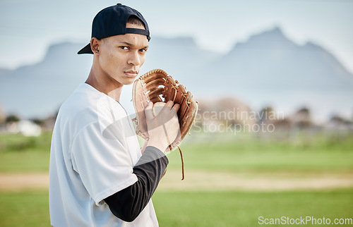 Image of Portrait pitcher, ready or baseball player training for a sports game on outdoor field stadium. Fitness, softball athlete or focused man pitching or throwing a ball with glove in workout or exercise