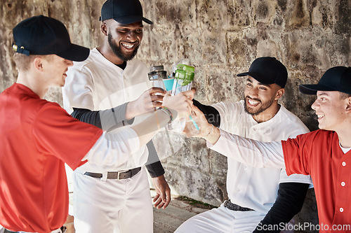 Image of Baseball player, team or men toast to success in training or match game to celebrate victory in stadium. Goals target, fun sports or healthy softball players in happy celebration with drinks together