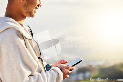 Image of Fitness man, hands and phone on mockup in social media, chatting or texting for travel, journey or trip in nature. Hand of male typing on smartphone with 5G connection for hiking, GPS or sunset view