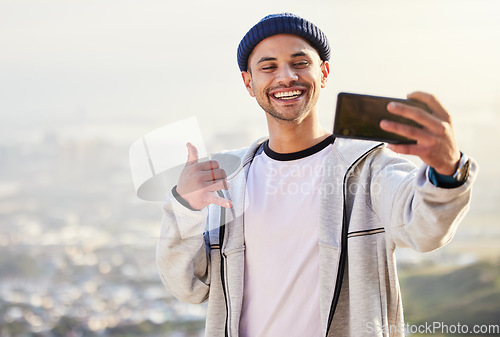 Image of Fitness, man and sunset with smile for selfie on mountain in social media, vlog or profile picture in nature. Happy male hiker smiling for photo, memory or online post in healthy wellness outdoors