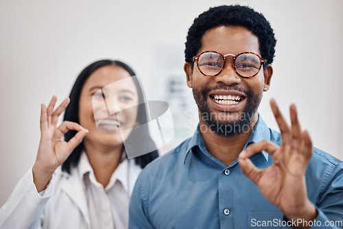 Image of Perfect, ok and portrait of optometrist with sign or gesture for new glasses, vision and and eye care in a clinic. Medical, people and black man with healthcare professional accept with smile