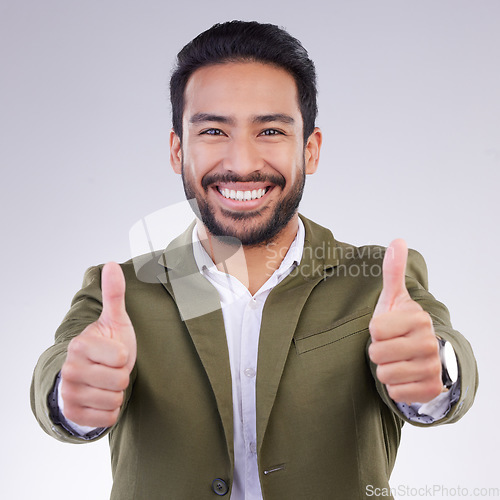 Image of Thumbs up, successful and portrait of businessman happy and smile for success isolated in a studio white background. Entrepreneur, Latino and man corporate employee excited, thank you and agreement