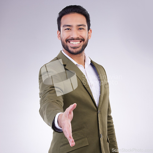 Image of Greeting or portrait of businessman handshake gesture with a smile and happy isolated in a studio white background. Professional, employee and man corporate worker shaking hand offer to welcome