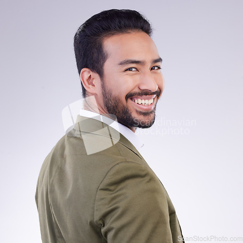 Image of Happy, smile and portrait of man in studio for professional, corporate and positive. Confidence, happiness and executive with male isolated on gray background for pride, elegant and opportunity