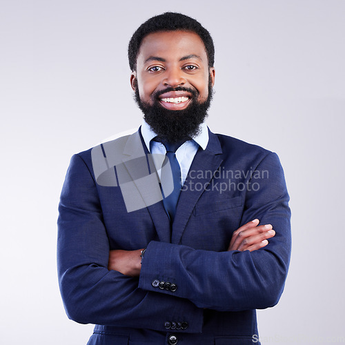 Image of Happy, arms crossed and portrait of black man in studio for professional, corporate and positive. Smile, confident and executive with employee isolated on grey background for pride, happiness and ceo