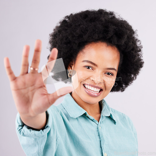 Image of Happy, smile and hand with portrait of black woman in studio for confidence, positive and relax. Happiness, stretching and palm with female on gray background for cheerful, carefree and friendly