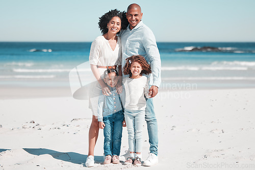 Image of Portrait, family and children on beach, vacation and summer break with happiness, cheerful and loving. Face, parents and children on seaside holiday, getaway and smile for bonding, trip and joyful