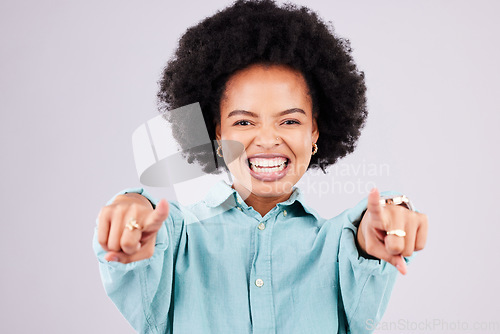 Image of Happy, pointing and portrait of black woman in studio for yes, opportunity and decision. Yes, smile and deal with female and gesture isolated on gray background for agreement, thank you and choice