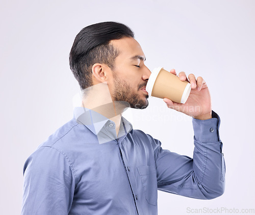 Image of Coffee, morning and businessman in a studio drinking a cappuccino before his corporate job. Professional, caffeine and male employee enjoying an espresso in takeaway cup isolated by gray background.