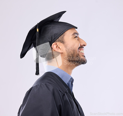 Image of University, graduation and man with success, knowledge and guy against a grey studio background. Male graduate, academic and student with robe, cap and education with development, learning and smile