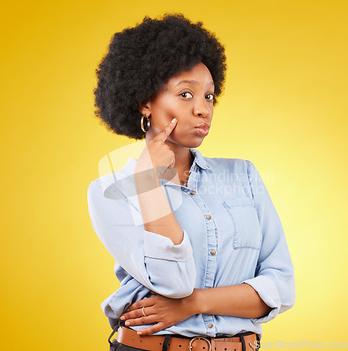 Image of Portrait, beauty fashion and black woman in studio isolated on a yellow background. Makeup, cosmetics and serious female model from South Africa with spa facial treatment for skincare or healthy skin