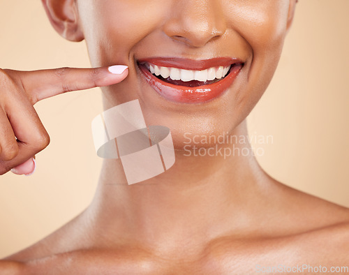 Image of Closeup, smile and mouth of woman in studio for dental, cleaning and hygiene treatment on brown background. Zoom, lips and teeth whitening for happy girl smiling after veneers, braces or oral care