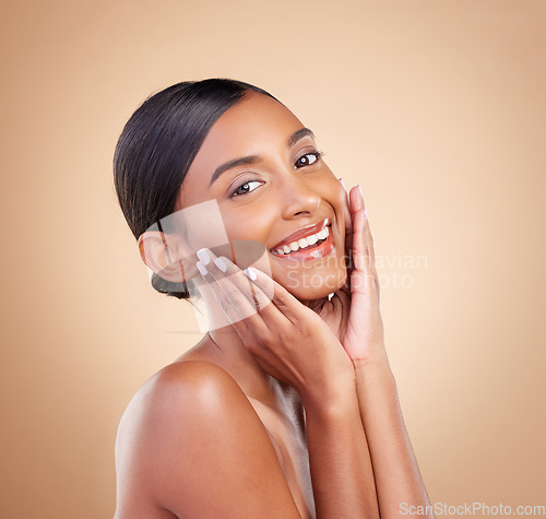 Image of Portrait, beauty and a happy model woman in studio on a beige background for natural skincare. Face, smile and aesthetic with an attractive young female posing for cosmetics or luxury wellness