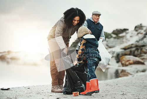 Image of Beach cleaning, plastic and child, family or volunteer group in education, learning and community support. Happy people, mother teaching kid or helping with waste, garbage or trash in climate change