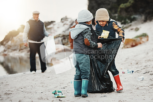 Image of Environment, plastic bags and children on beach, recycle and cleaning on earth day, reduce waste and helping. Friends, volunteers and kids with climate change project, sustainability or pick up trash