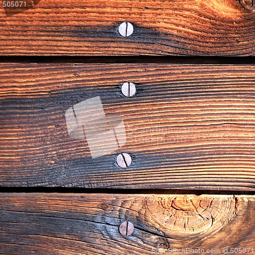 Image of Wooden Background with Screws
