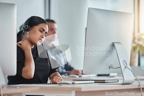 Image of Neck pain, call center and stress with woman in office for communication, consulting and customer service. Burnout, body ache and tired with employee at computer for hotline, help desk and advisory