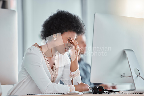 Image of Tired, headache and woman on computer in office workspace with job depression, burnout and mental health risk. Business person working on desktop with workplace noise and stress, fatigue or migraine