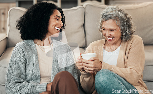 Image of Love, mother and adult daughter on floor, coffee and conversation with happiness, break and laughing. Family, mama and female grown child on ground, tea and smile with rest, funny and quality time