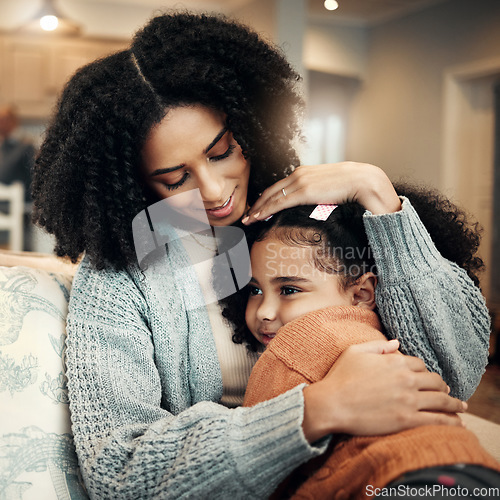 Image of Family, love or kid hug mother for Mothers Day, home bonding or embrace on living room couch. Care, custody and biracial mom, mama or woman with female youth child, girl or daughter on apartment sofa