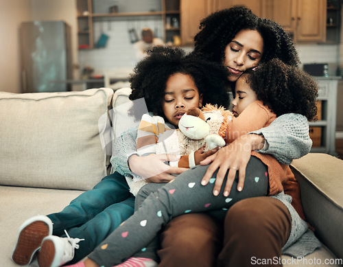 Image of Family, sleep or children hug mother for Mothers Day, home bonding or embrace on living room couch. Care, love and relax mom or woman with female youth kids, girl or daughter resting on sofa