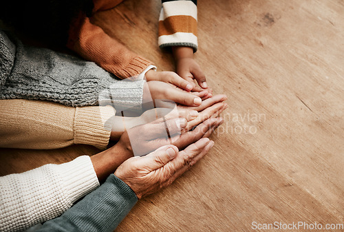 Image of People, hands together and generations in care above on mockup for unity, compassion or trust on wooden table. Group holding hand for support collaboration, love or community in teamwork solidarity