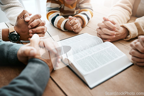 Image of Bible, reading book or hands of big family in prayer, support or hope in Christian home for worship together. Mother, father or grandparents studying, praying or asking God in religion with children