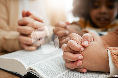 Image of Bible, praying or hands of woman with children siblings for worship, support or hope in Christianity. Kids education, prayer or mother studying, reading book or learning God gospel in religion blur