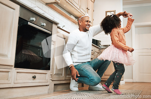 Image of Child, ballet dance twirl and happiness of girl and father together bonding with dancing in the kitchen. Home, kid and dad with parent love and care in a house playing a dancer game for children fun