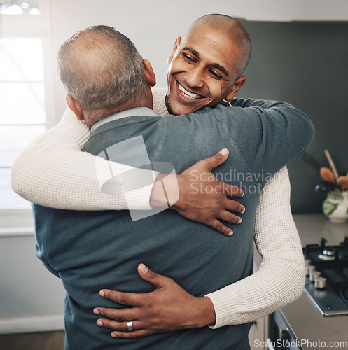 Image of Family, hug or son with senior father for Fathers Day love, home bond or embrace in modern kitchen. Smile, happiness or support care from Mexico dad, papa or man in emotional reunion with male in law