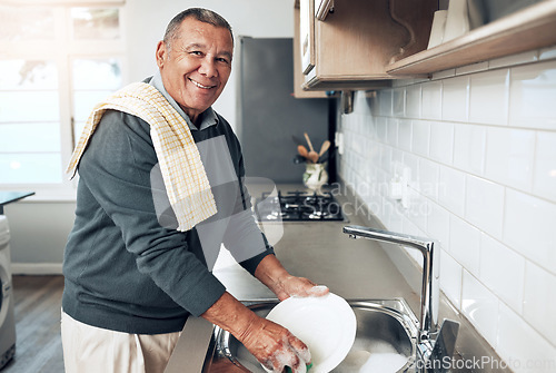 Image of Cleaning, washing dishes or portrait of happy old man with soap water in kitchen sink in healthy home. Dirty, smile or senior male with liquid foam to disinfect, protect or prevent bacteria or germs