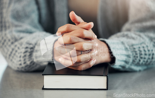 Image of Bible book, old man or praying for hope, help or support in Christianity religion or holy faith on table. Believe, prayer or person studying or worshipping God in spiritual literature at home