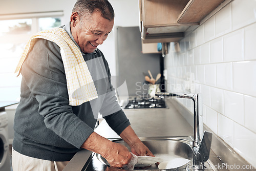 Image of Cleaning, washing dishes or happy old man with soap and water in the kitchen sink in healthy home. Dirty, messy or senior person with liquid foam to disinfect, protect and prevent bacteria or germs