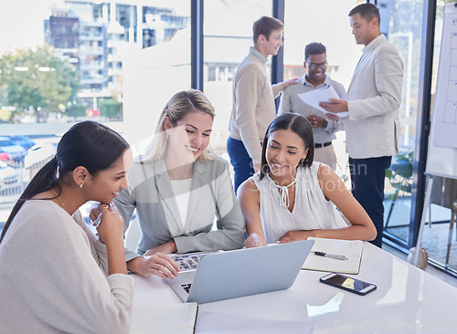 Image of Planning meeting, laptop and strategy team communication, discussion or conversation about brand design idea. Collaboration, teamwork and business people working, consulting or talking about project