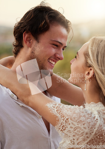 Image of Couple, love and hug outdoor with a smile, care and romance on a date in nature. Young man and woman happy together on valentines day with trust, peace and freedom or support with a smile in forest
