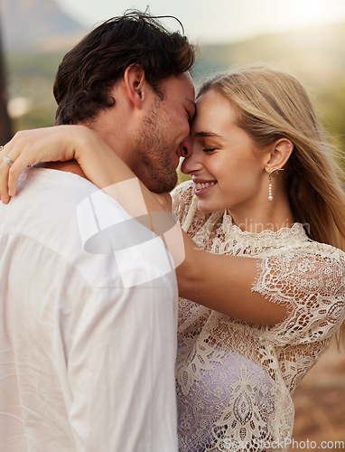 Image of Couple, love and hug outdoor with a smile, care and romance on date in nature. Young man and woman happy together on valentines day with trust, peace and freedom or support in forest for anniversary