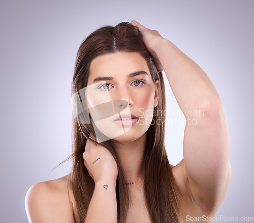 Image of Face portrait, beauty and hair care of a woman in studio isolated on a background. Natural cosmetics, growth and confident female model with salon treatment for healthy keratin, texture and hairstyle